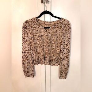 Long Sleeve print blouse with ruffled bottom